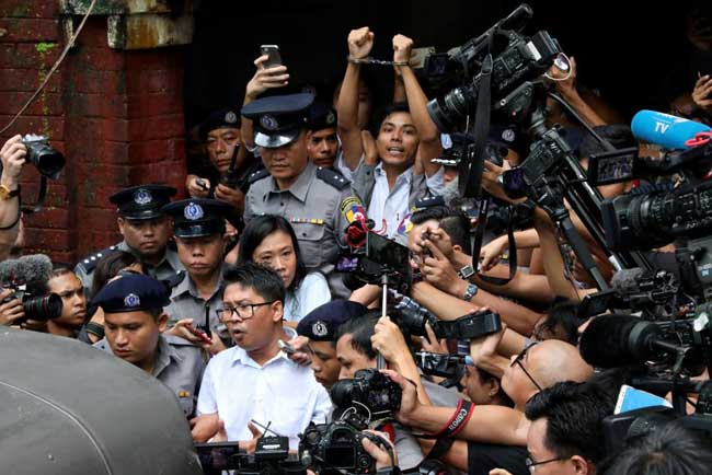Myanmar jails two Reuters journalists for 7 years amid international outrage