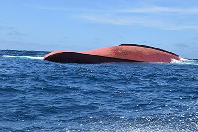China scales down rescue effort for missing crew of capsized vessel