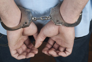 Two held with firearm and grenade